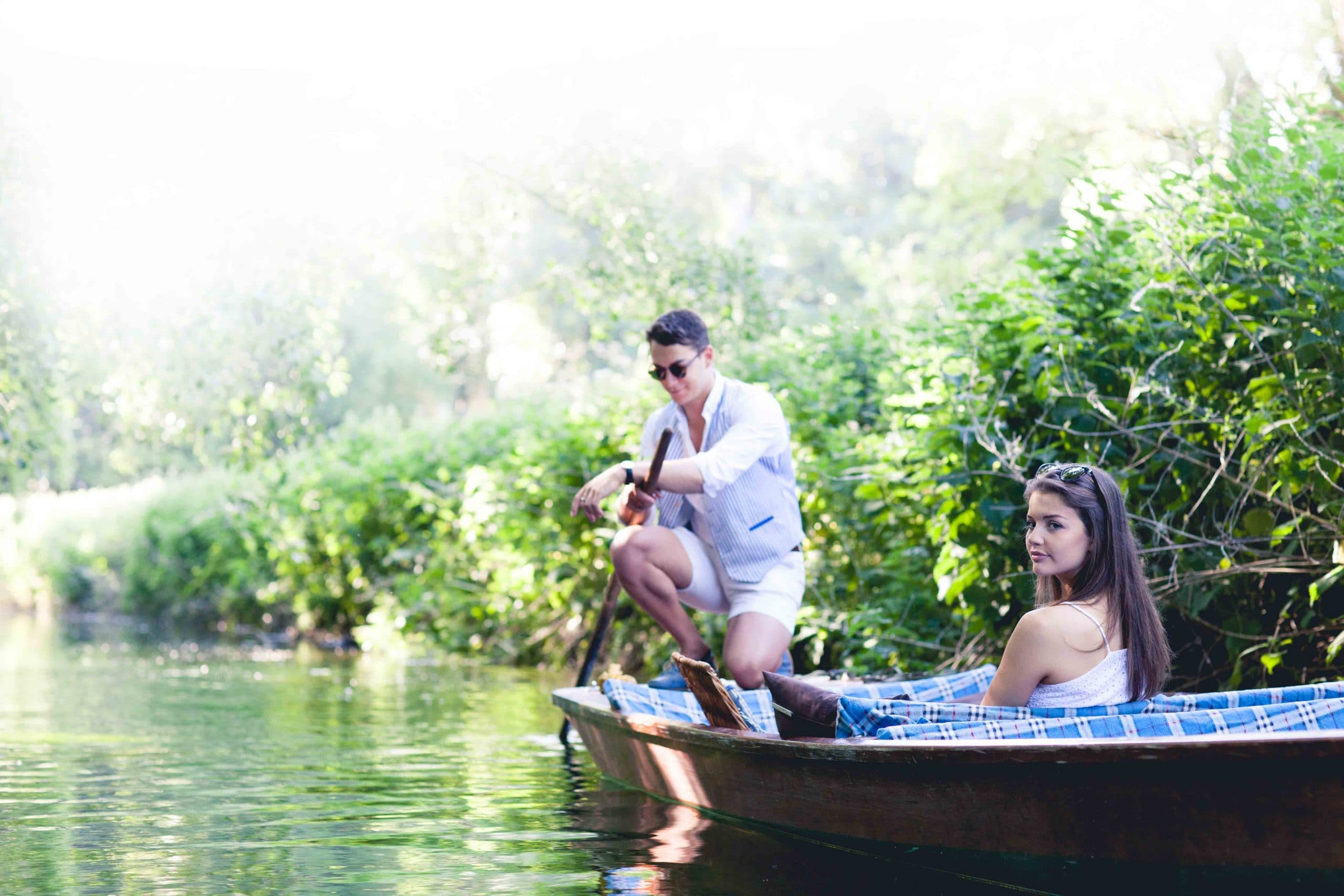 Couple enjoying a punting tour on the River Stour